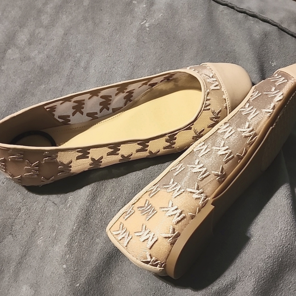 Michael kors blush pink flats with mk logo all over and mesh sides